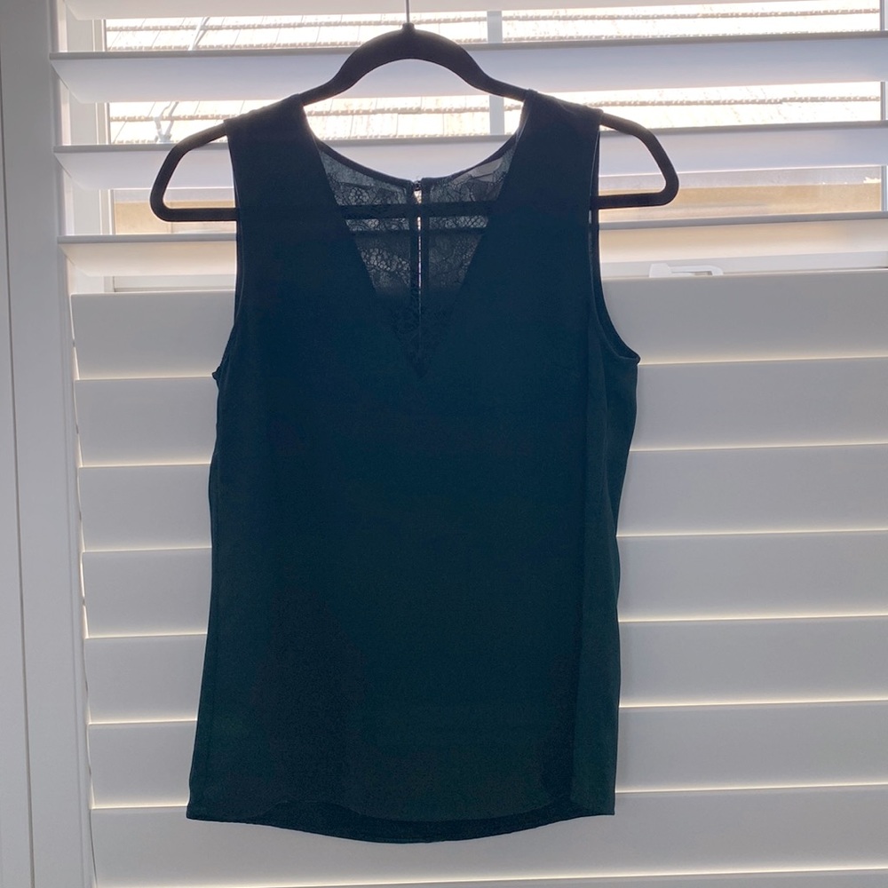 Teal top from H&M. Has beautiful lace V neck.